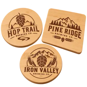 Brewery bamboo coasters with custom brewery logo samples on a transparent background