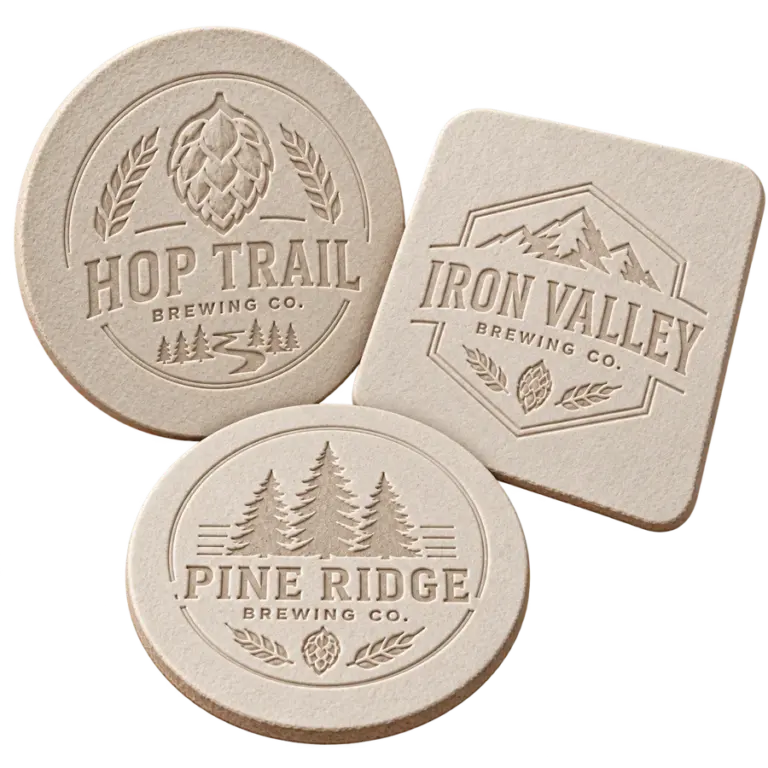 Brewery debossed coasters with custom brewery logo samples on a transparent background